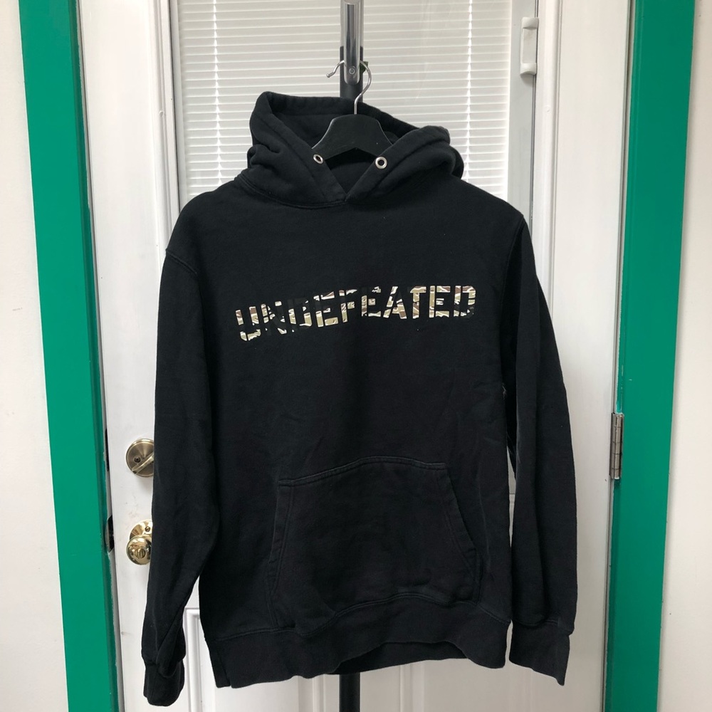 Undefeated Camo Text Hoodie
